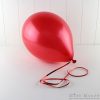 Metallic Red Balloons you can fill with helium or air.