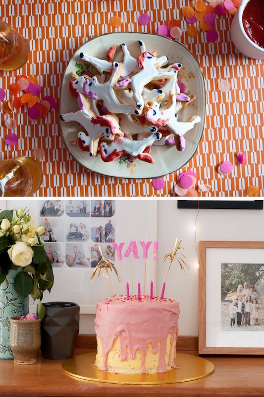 Pink and orange party theme with a Yay cake topper and unicorn cookies.