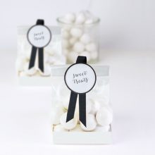 White treat bags by Paper Eskimo make fabulous wedding favours.